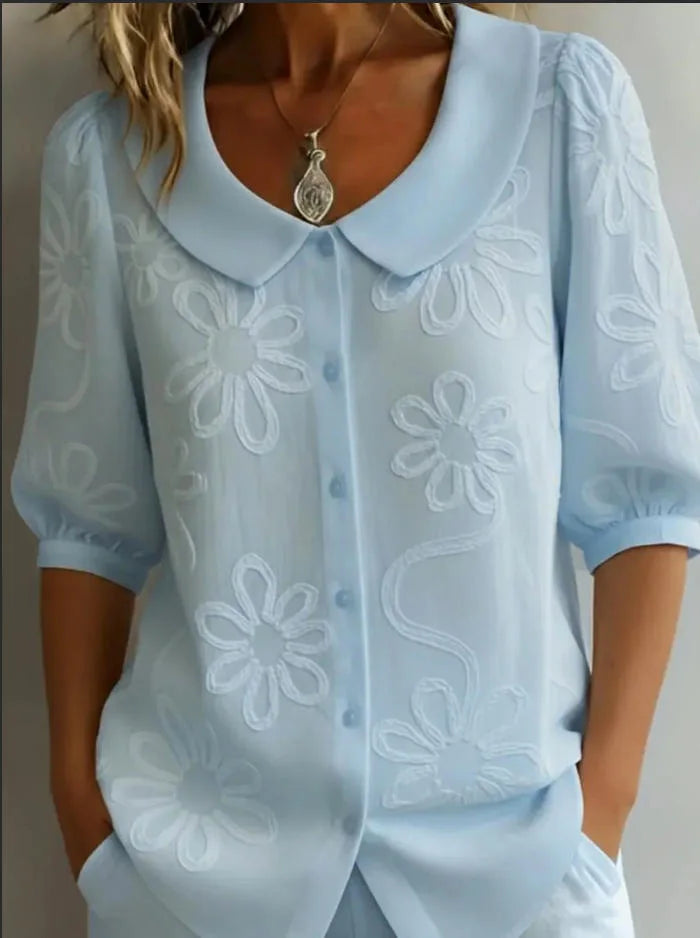 BLUSA DE FLORES ELEGANTE