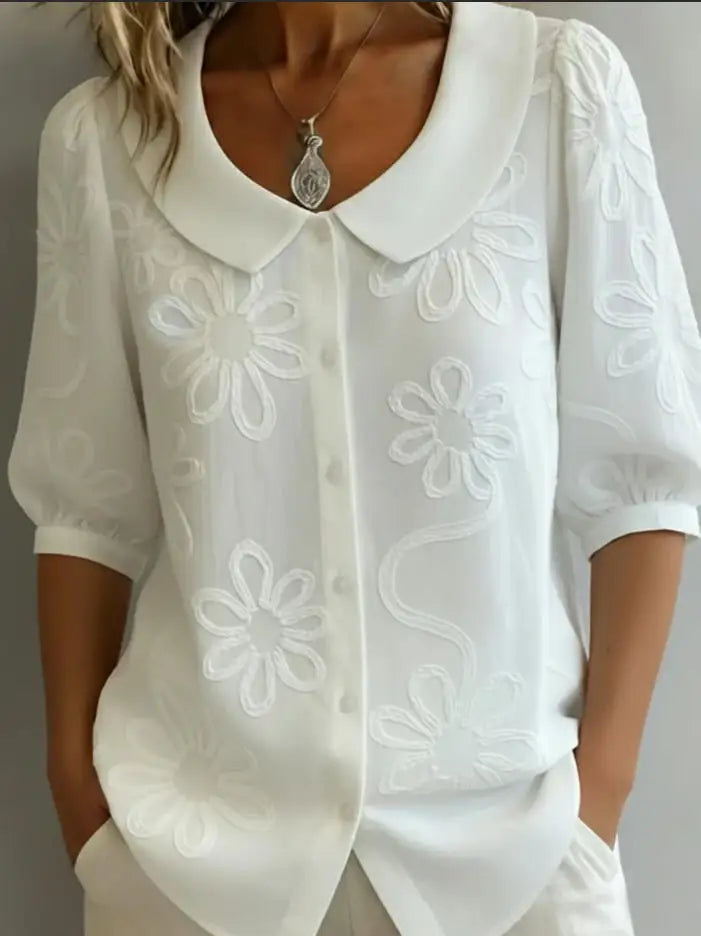 BLUSA DE FLORES ELEGANTE